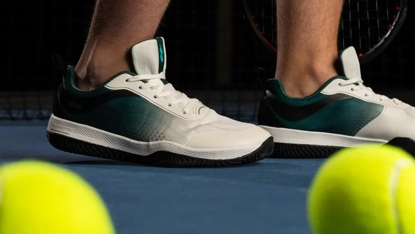 CUURT court shoes with a wide toe box on a blue hard court